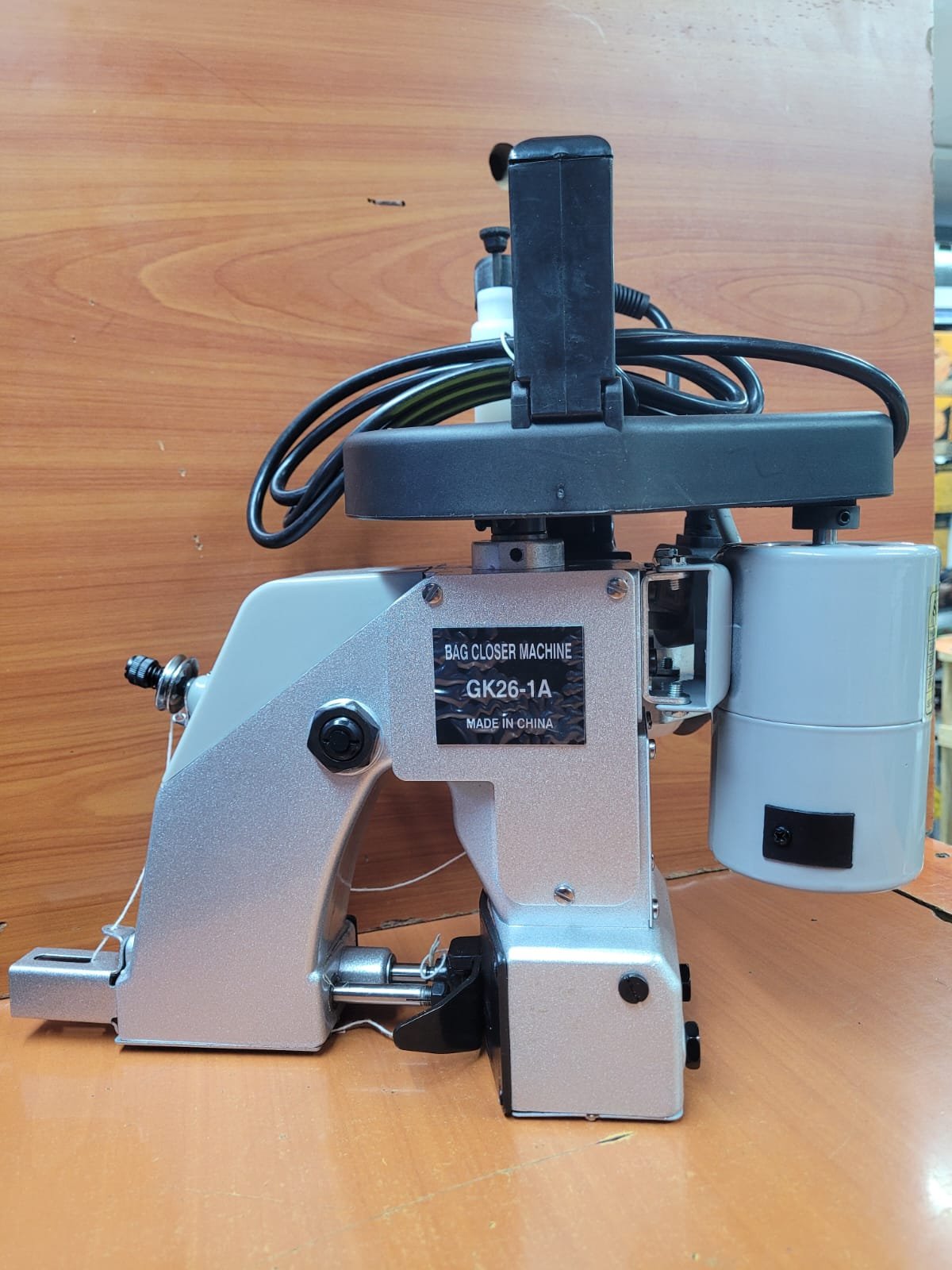 Commercial electronic bag closer